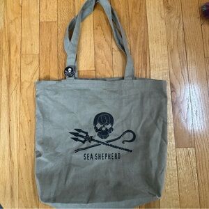 Sea Shepherd khaki canvas tote, rare. With jolly Roger pin.